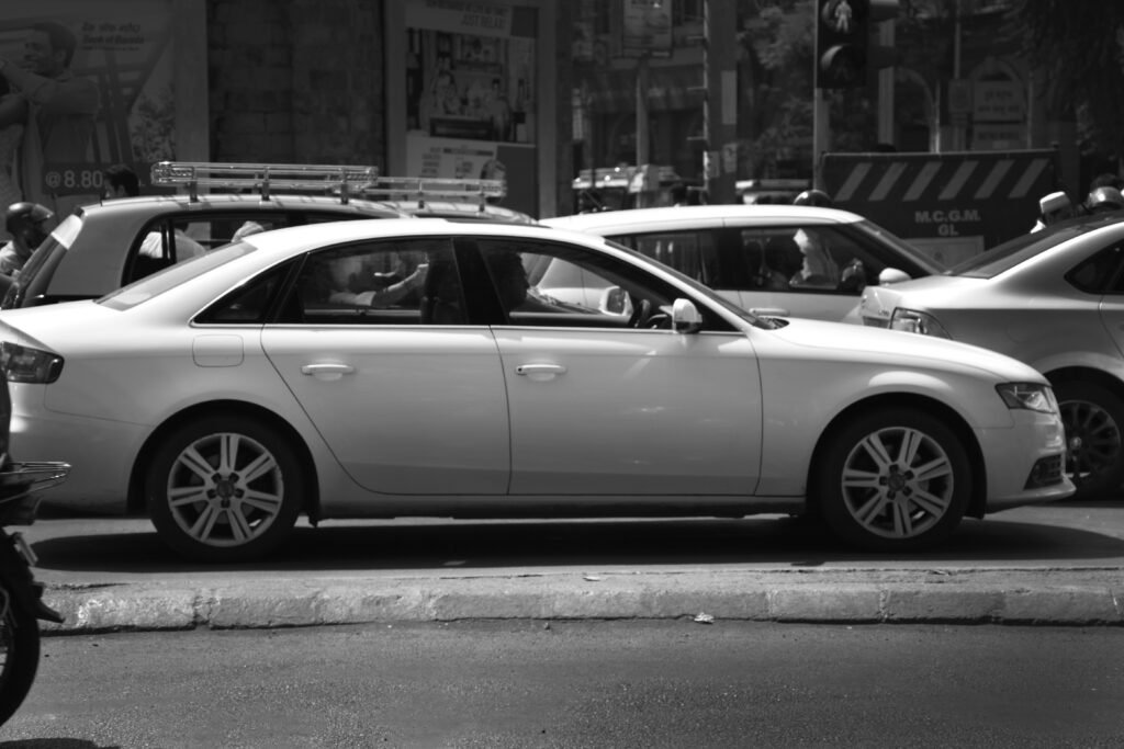 a black and white photo of a busy street